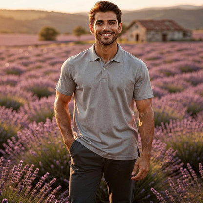 View of a navy blue slim fit short sleeve polo shirt featuring a v neck and soft cotton material
