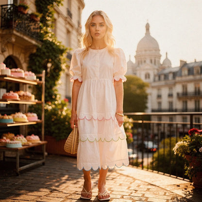 View of a flowy A line midi dress in soft fabric, featuring a round neck and vibrant floral pattern, ideal for summer wear
