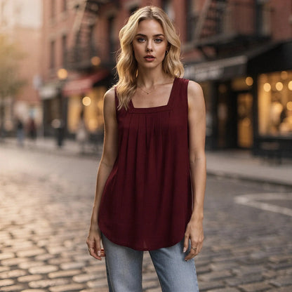 Lightweight sleeveless midi summer top in soft cotton blend, featuring a relaxed fit and a subtle floral pattern