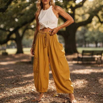 Light gray high rise wide leg comfort pants made from soft fabric, featuring a relaxed fit and pockets, view