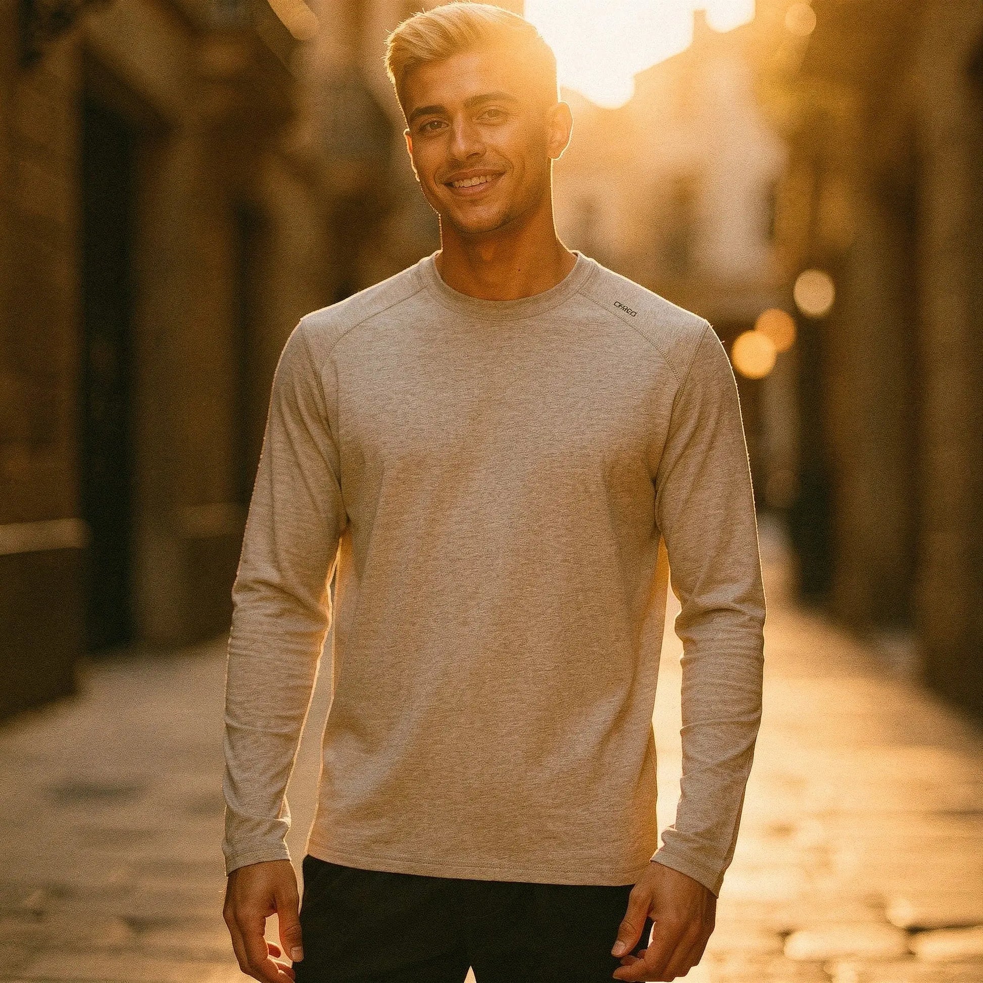 View of a relaxed fit crew neck long sleeve t shirt in soft cotton fabric, featuring a subtle heather gray color