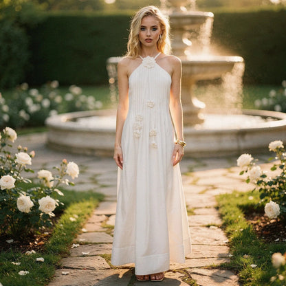 View of a relaxed fit halter maxi dress in soft fabric, featuring a flowing skirt and elegant silhouette, perfect for summer occasions
