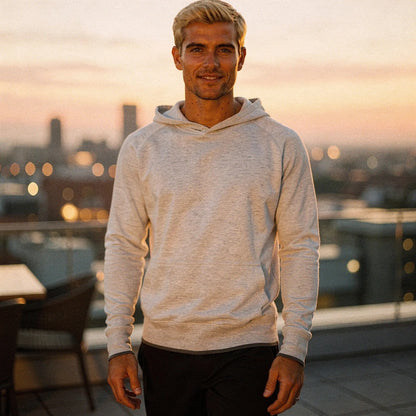 View of a relaxed fit crew neck long sleeve casual hoodie in dark gray, featuring ribbed cuffs and a soft fabric texture