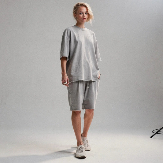 View of a relaxed fit crew neck short sleeve midi dress in soft cotton fabric, featuring a solid color and casual style