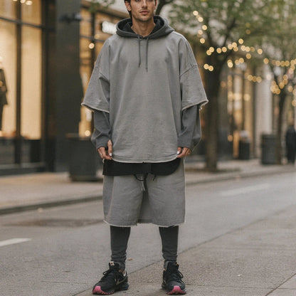 View of a relaxed fit crew neck short sleeve sports set in light gray, showcasing soft fabric and comfortable stitching