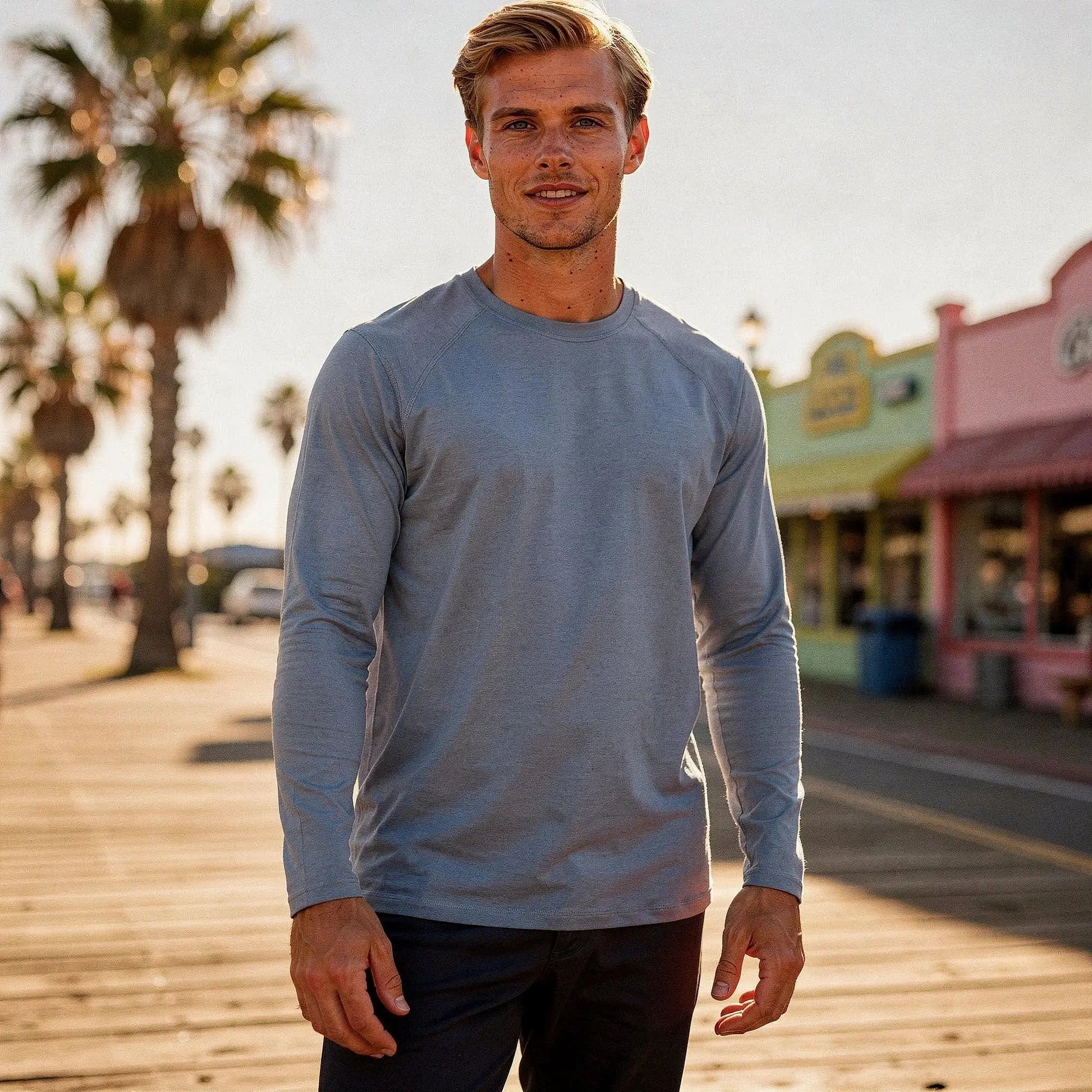 View of a slim fit long sleeve crew neck casual fitness t shirt in light gray, showcasing soft cotton material and stitching details