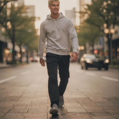 View of a relaxed fit crew neck long sleeve casual hoodie in dark gray, featuring a soft fabric and ribbed cuffs