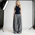 View of relaxed fit high waist wide leg baggy pants in soft cotton fabric, featuring a casual style and neutral color