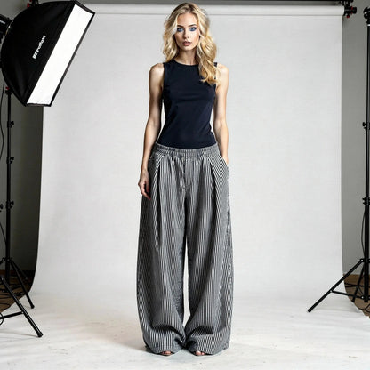 View of relaxed fit high waist wide leg baggy pants in soft cotton fabric, featuring a casual style and neutral color