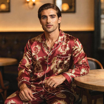 View of relaxed fit long sleeve silk pajamas set in deep navy, featuring a notch collar and button closure