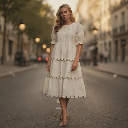 View of a flowy A line midi dress in soft fabric, featuring a round neck and vibrant floral pattern