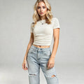 View of a white slim fit crew neck cropped t shirt made