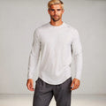 View of a slim fit long sleeve crew neck casual fitness t shirt in dark gray, made